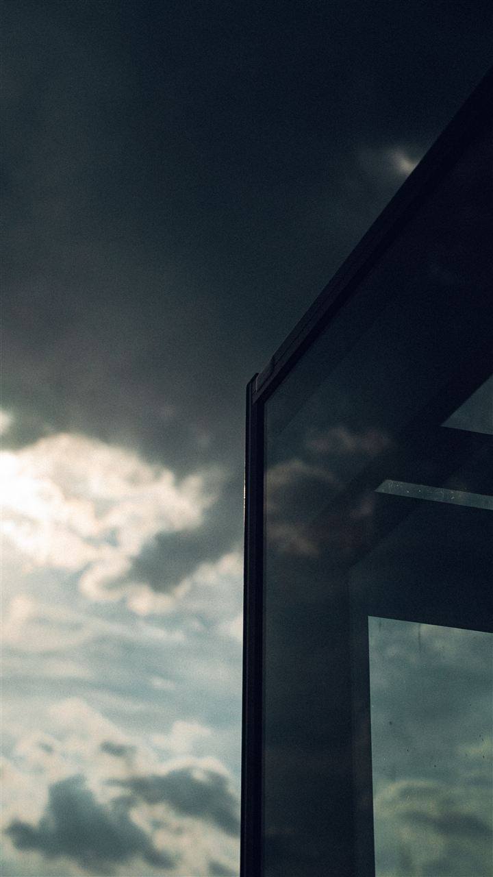 Himmel och hav speglas i växthusets glas